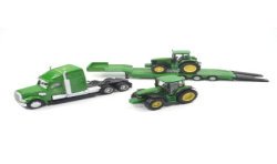 Freightliner Coronado with low loader and John Deere tractors