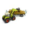 Claas Axion 850 tractor met balengrijper en aanhangwagen