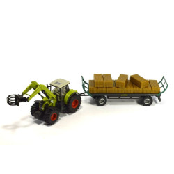 Claas Axion 850 tractor met balengrijper en aanhangwagen