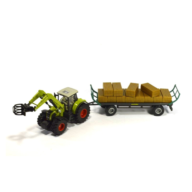 Claas Axion 850 tractor met balengrijper en aanhangwagen