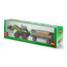 Claas Axion 850 tractor met balengrijper en aanhangwagen