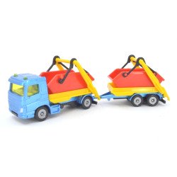 Volvo FM truck with skips