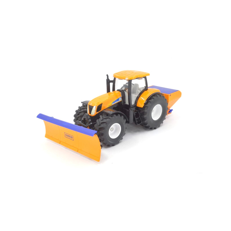 New Holland T9090 mit Schneepflug und Streuer