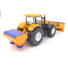 New Holland T9090 mit Schneepflug und Streuer