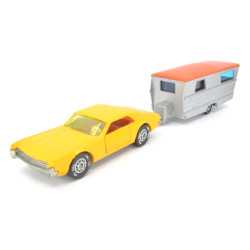 Oldsmobile Toronado with caravan