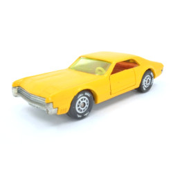 Oldsmobile Toronado with caravan