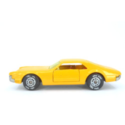 Oldsmobile Toronado with caravan