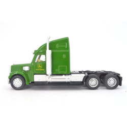 Freightliner Coronado with low loader and John Deere tractors