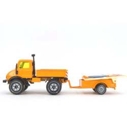 Mercedes Unimog U406 with warning trailer