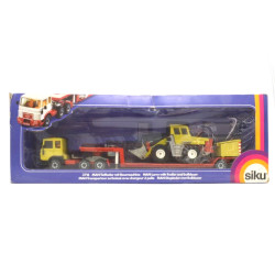 MAN 8.156F with low loader and wheel loader