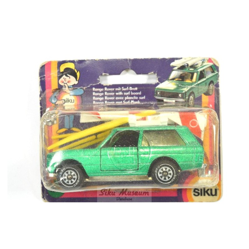 Range Rover met surfplank