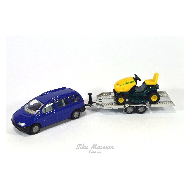 Volkswagen Sharan with trailer and lawn mower