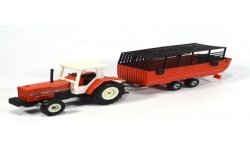 Massey Ferguson with hay trailer
