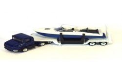 Scania with low loader and boat