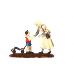 DRK zuster (helpt jongen met speelgoed)